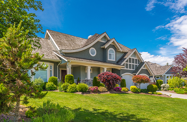 House with floral landscape.
